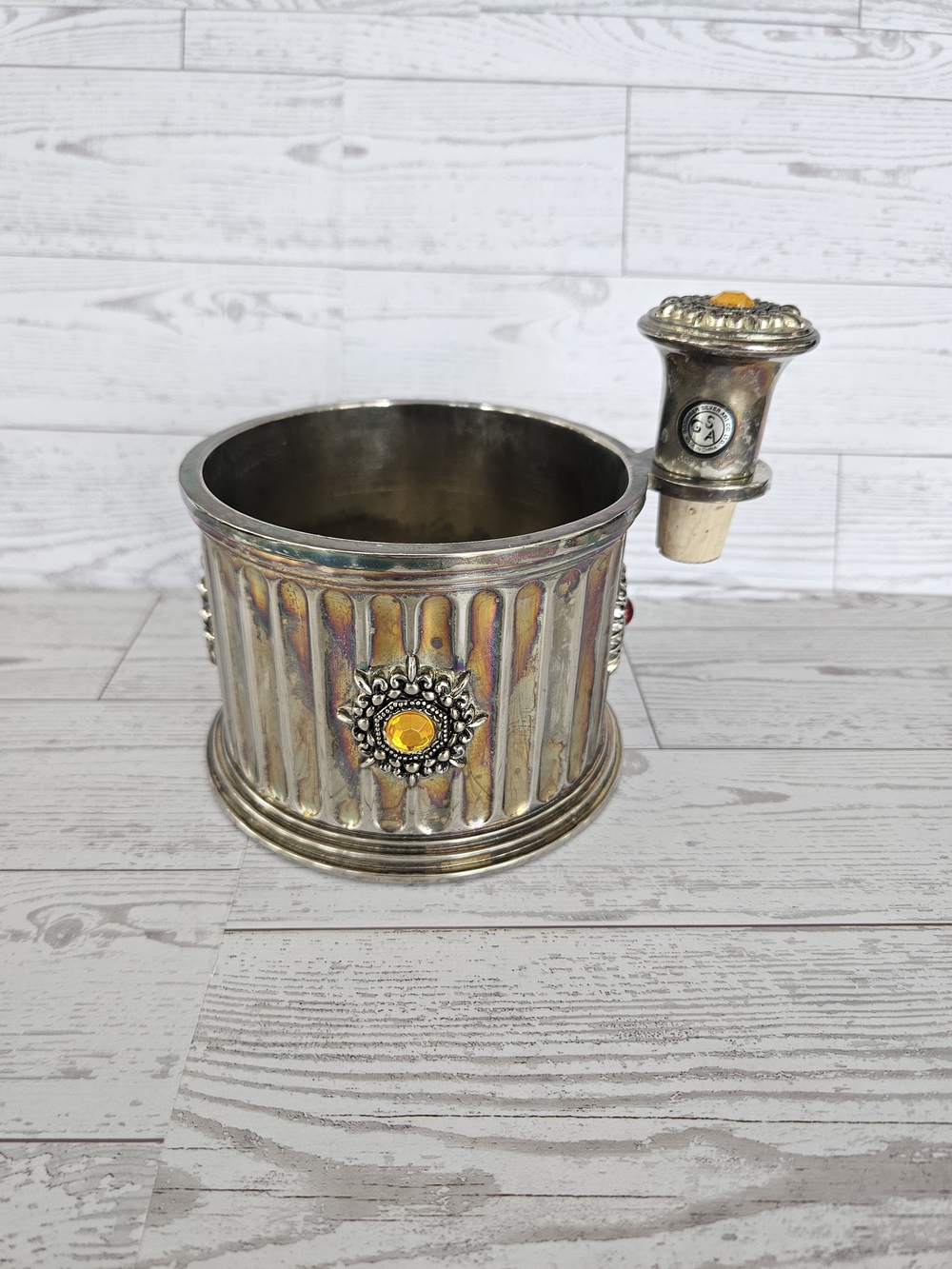 Decorative Silver-Tone Wine Bottle Coaster with Amber Accent